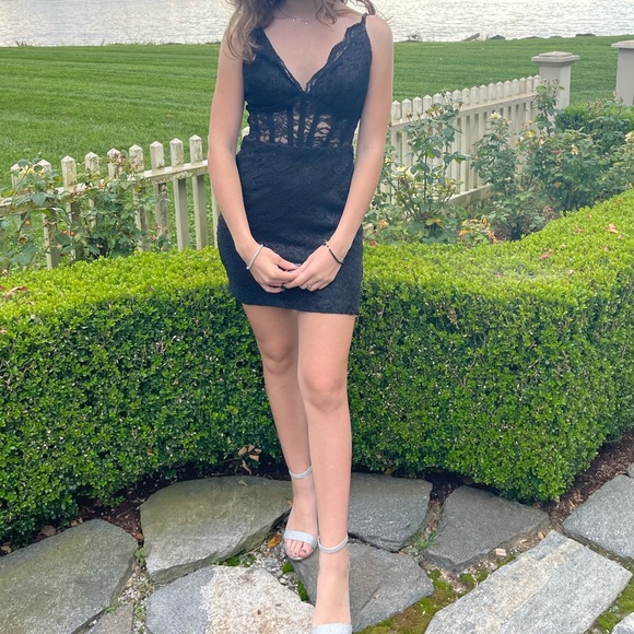 black lace ladder detail frill hem bodycon dress Feels Just Right Black Puff Sleeve Embroidered Eyelet Mini Dress main image 0